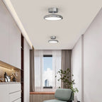 Novoora minimalist LED ceiling light with a modern iron and acrylic design installed in a bright living room.